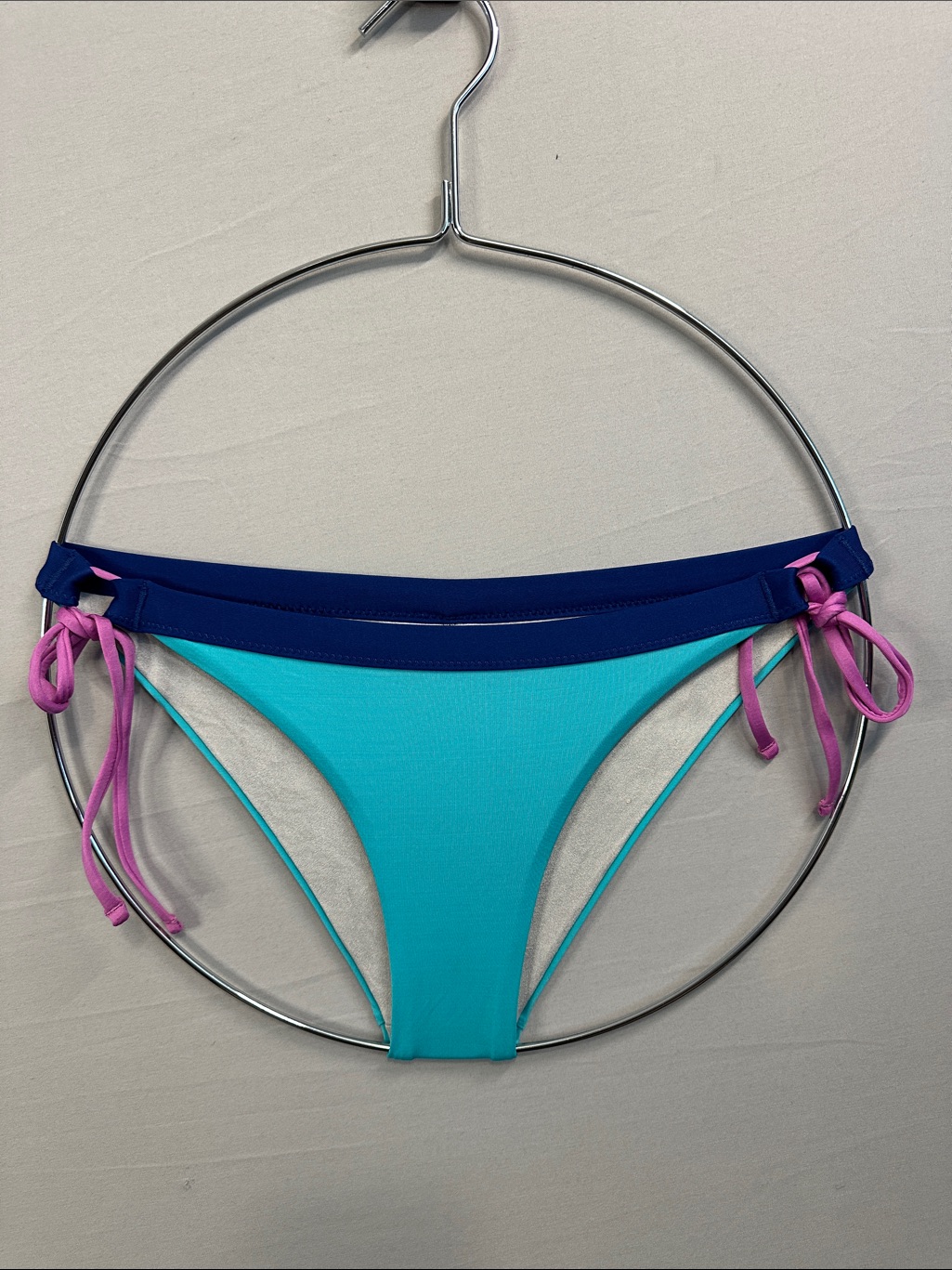 Patagonia Turquoise Bikini Bottom With Navy Waistband And Purple Side Ties